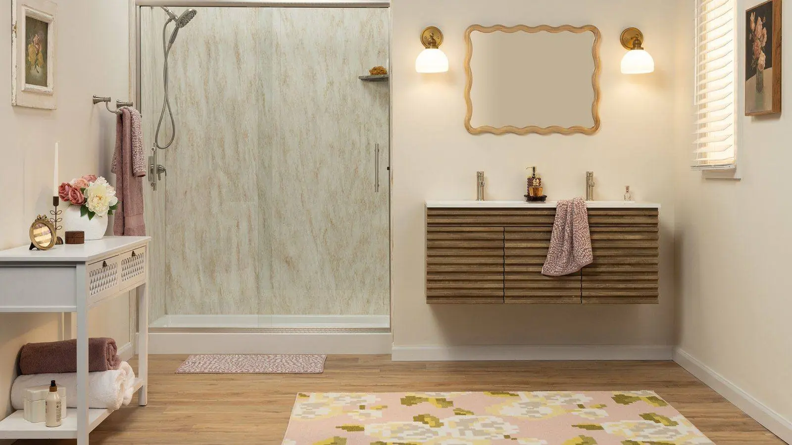 Bright bathroom with a Luxury Bath glass shower and a double floating vanity