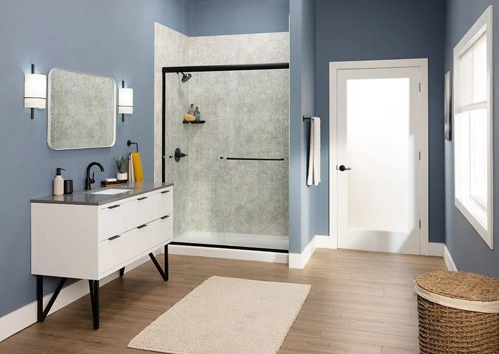 Modern Spokane bathroom with a black framed glass shower and a floating white vanity