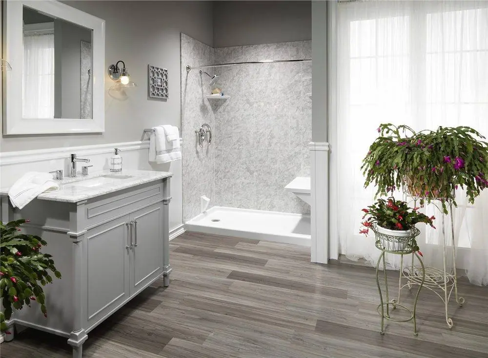 Walk-in shower with gray marble look walls, a style we install in Spokane Valley homes