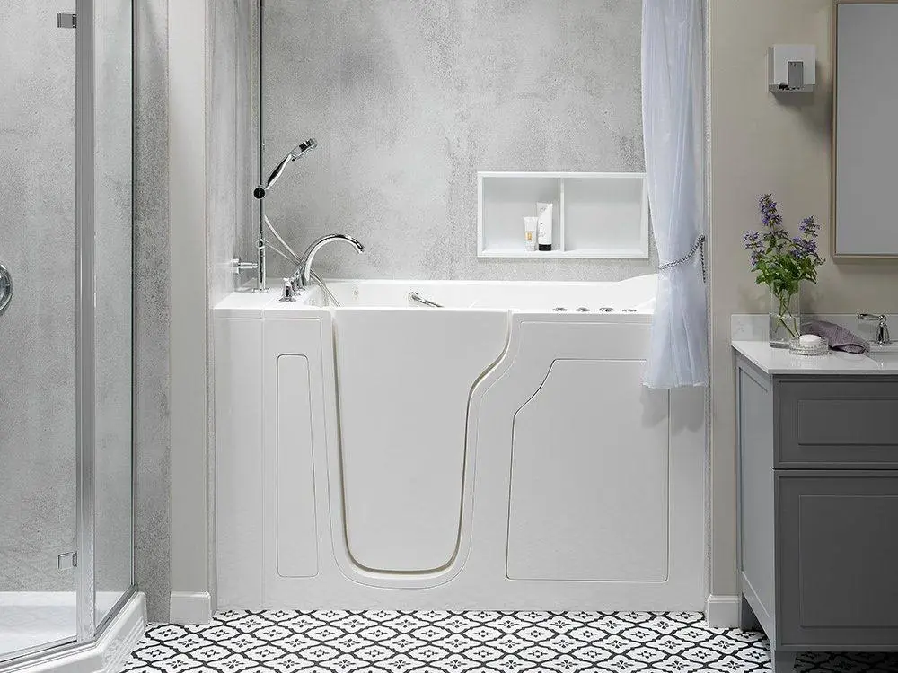 Luxury Bath walk-in tub with a low door and grab bar beside a glass shower