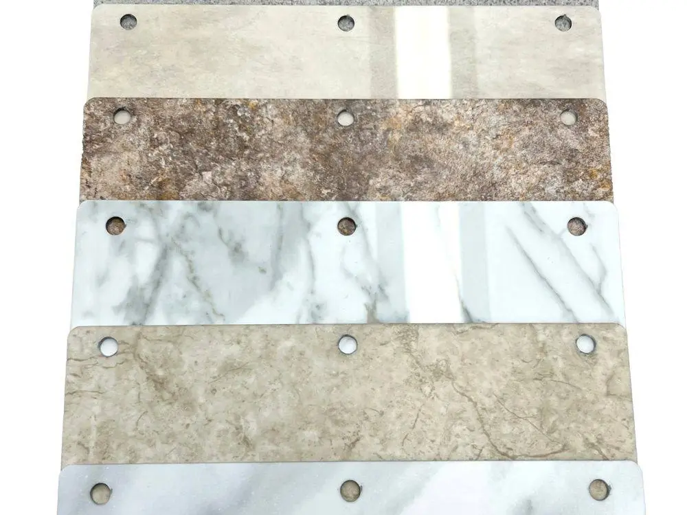Acrylic wall panel samples in cream, granite, white marble and beige stone looks
